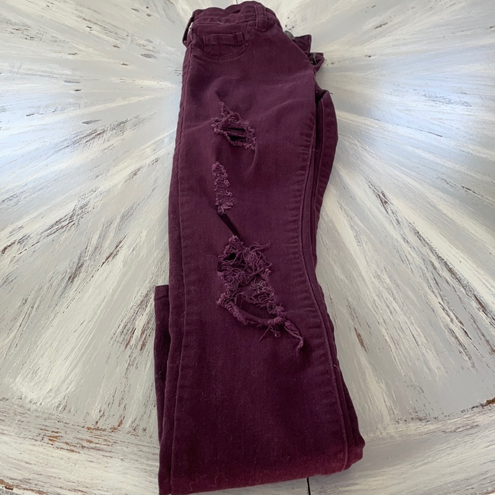 Purple distressed jeans